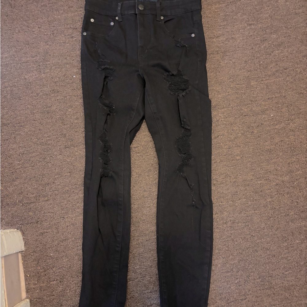 Aero women’s black ripped skinny jeans
